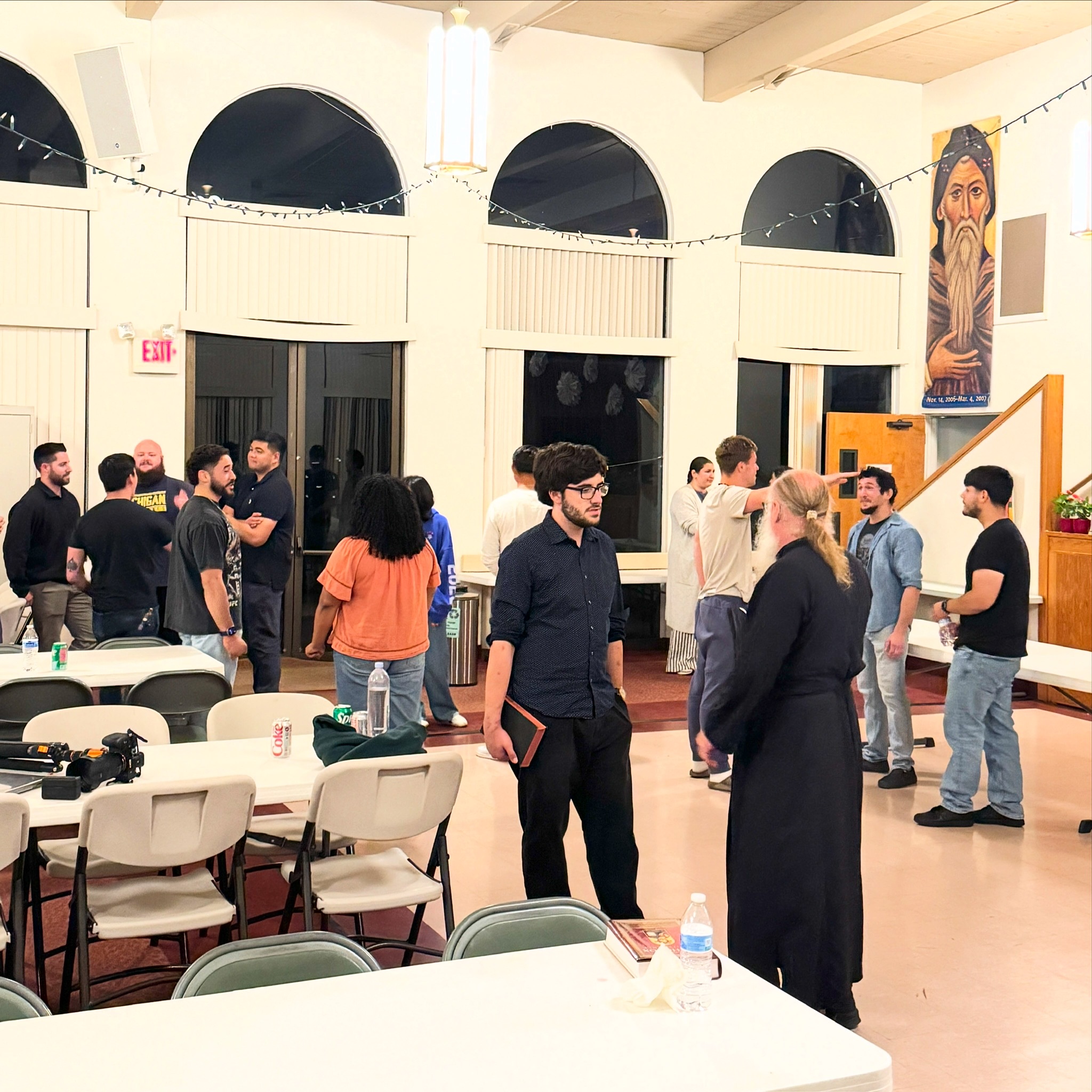 Parishioners enjoying conversation and fellowship at St. Luke
